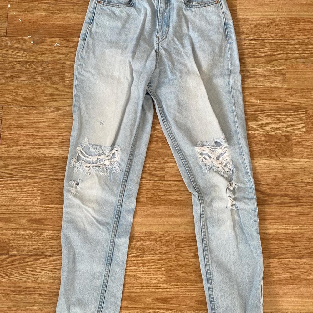 Distressed Light Wash Denim Jeans